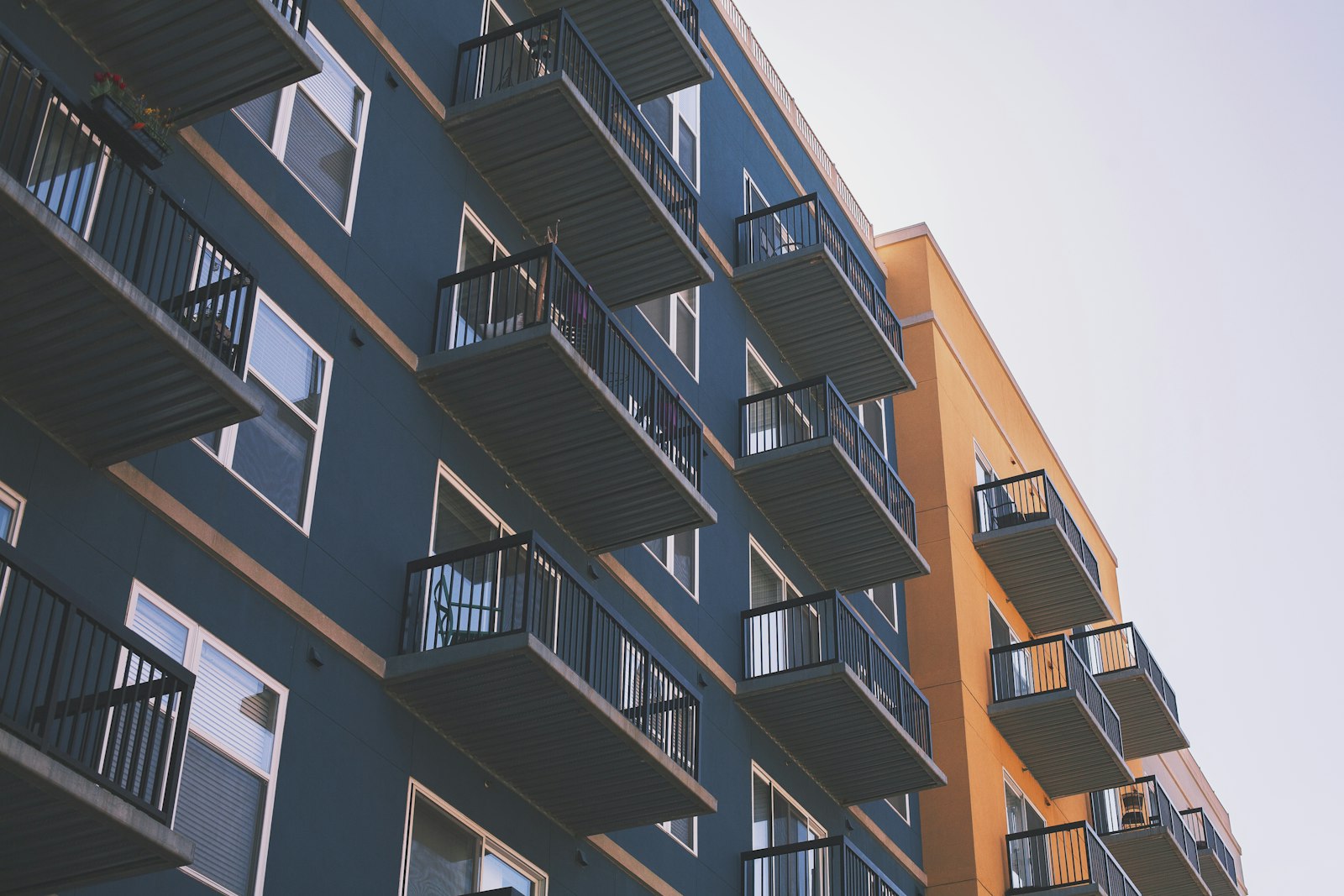 Managed residential and commercial block with balconies.