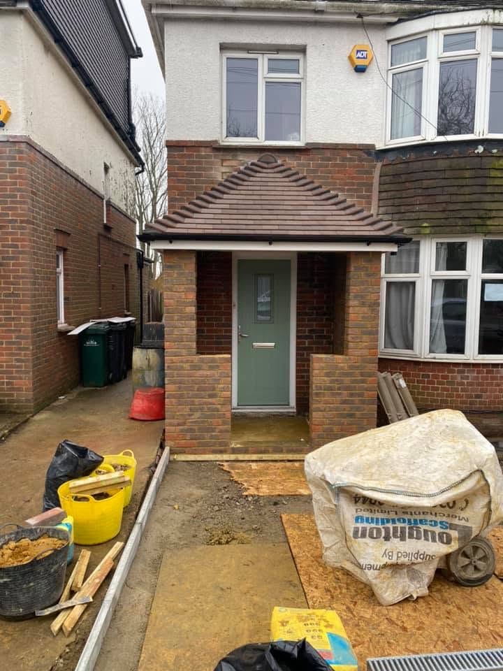 Completed porch rebuild on an occupied home by SRB Services.
