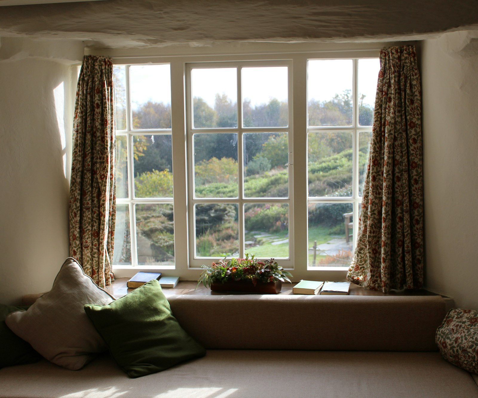 Traditional multi-pane windows in a period cottage.